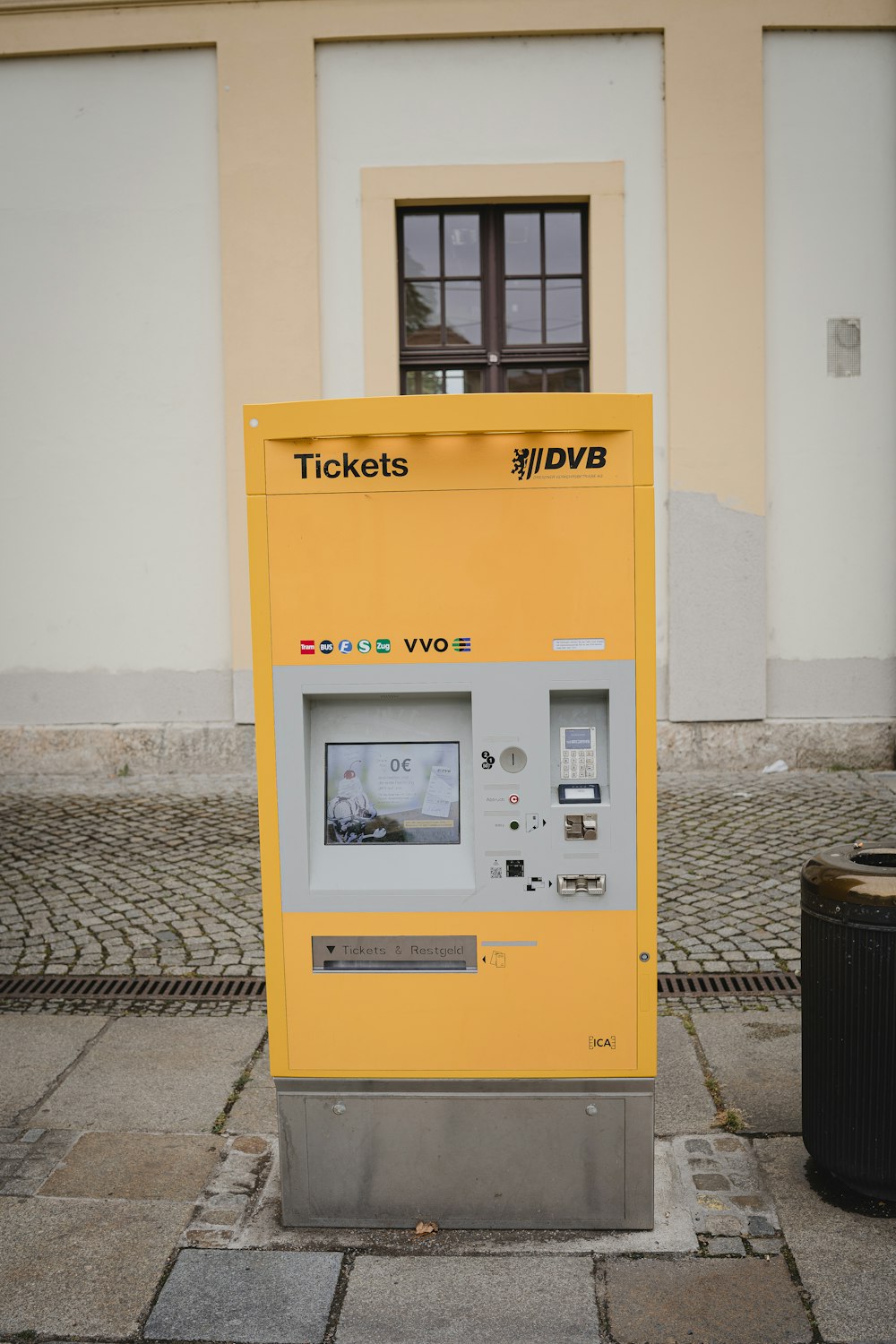 a yellow pay phone