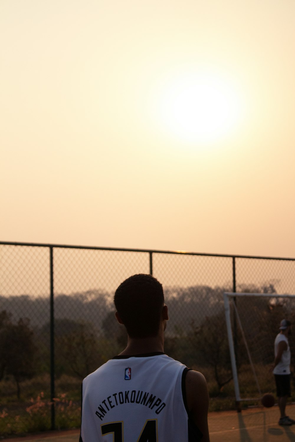 a boy playing basketball