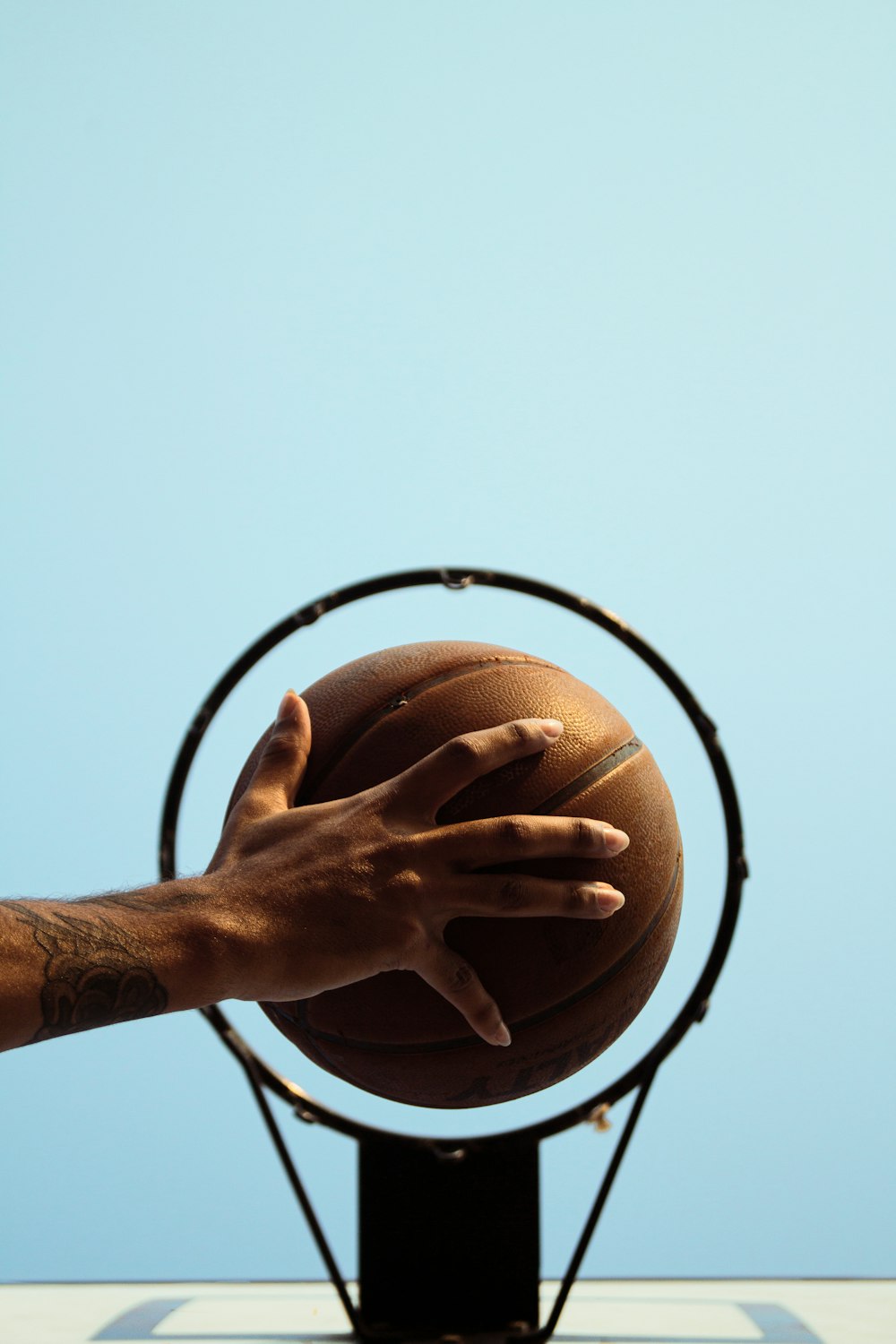 a hand holding a magnifying glass