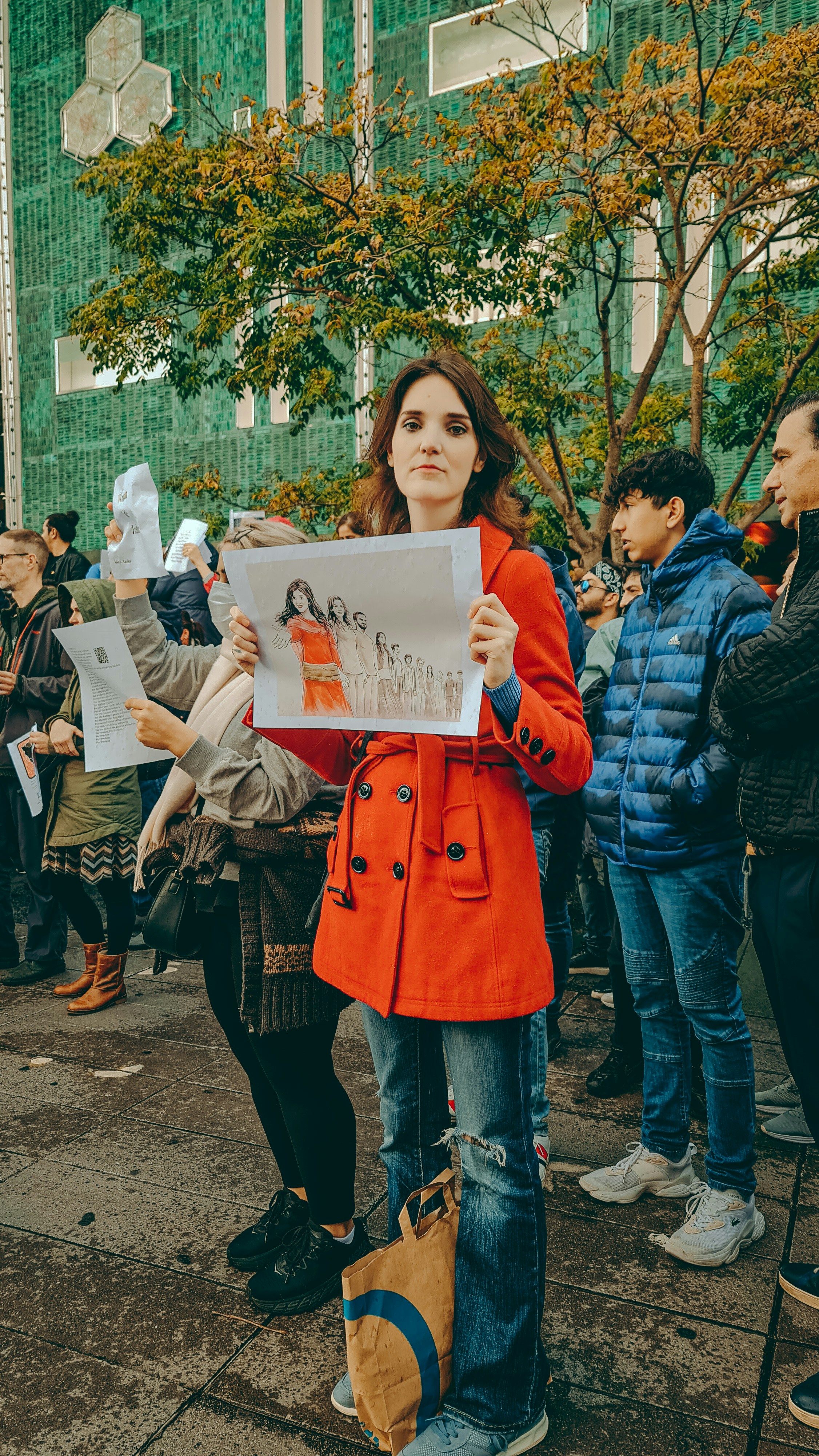 a person holding a paper