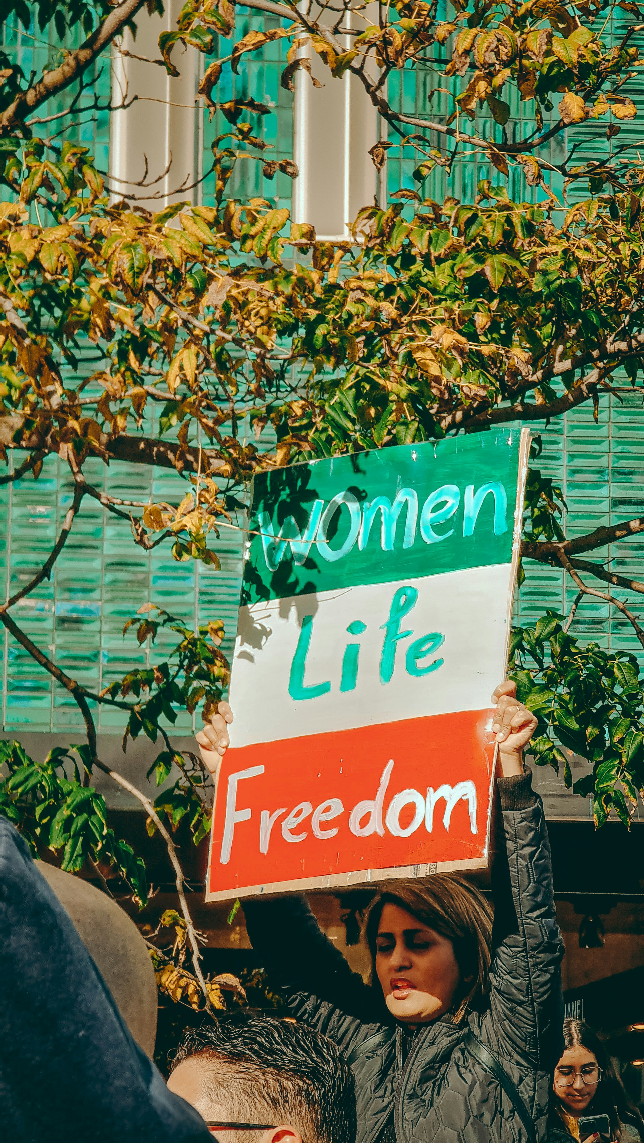 a person holding a sign