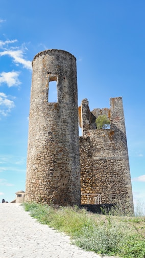 a stone tower with a window