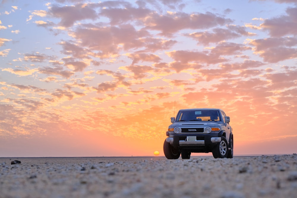 a car parked on a beach