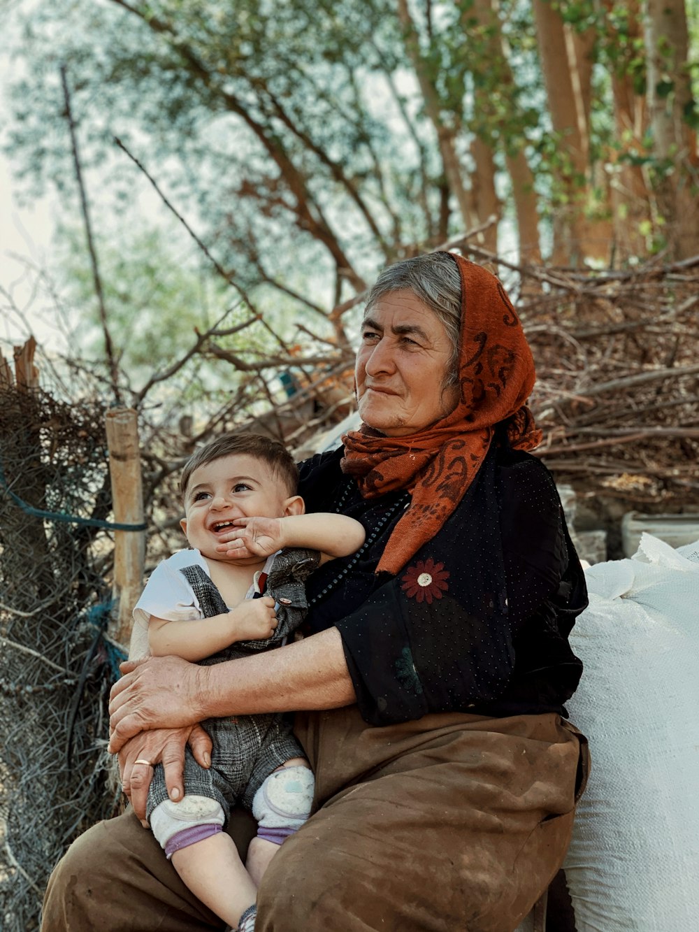 a person holding a baby