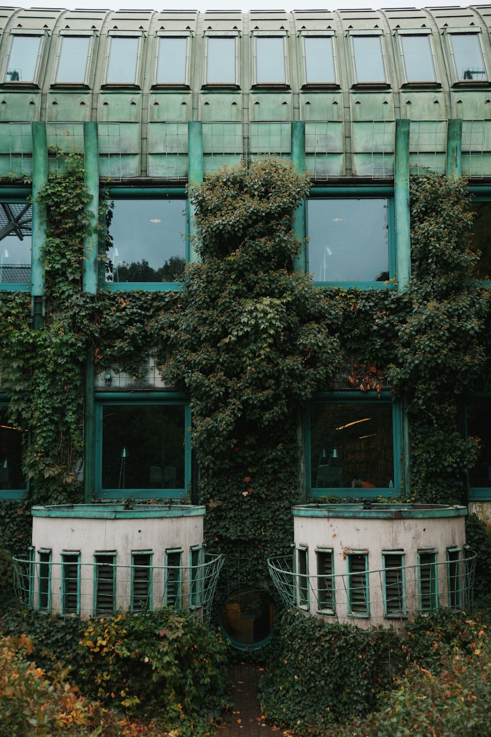 a building with plants growing on it