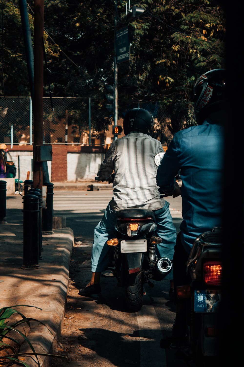 a couple of men on motorcycles