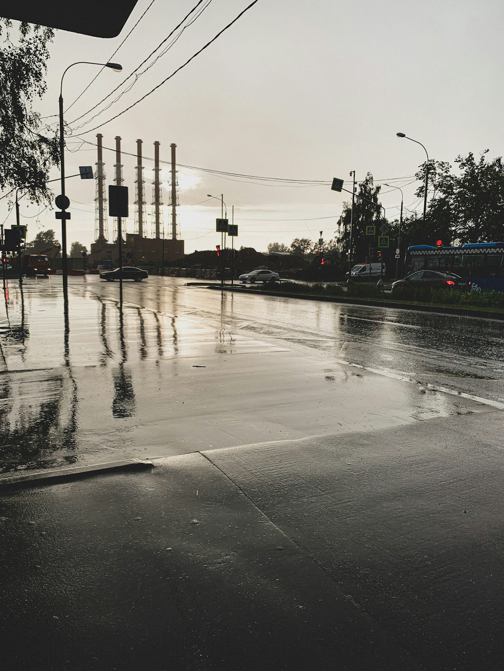 a flooded street with cars