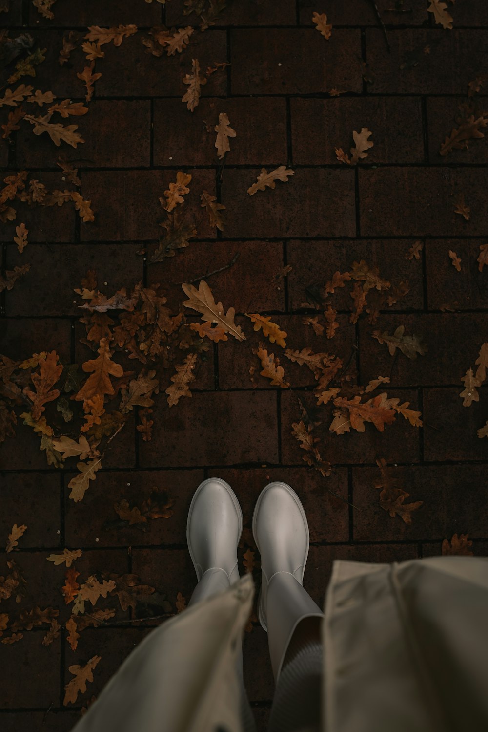 a foot on a brick wall