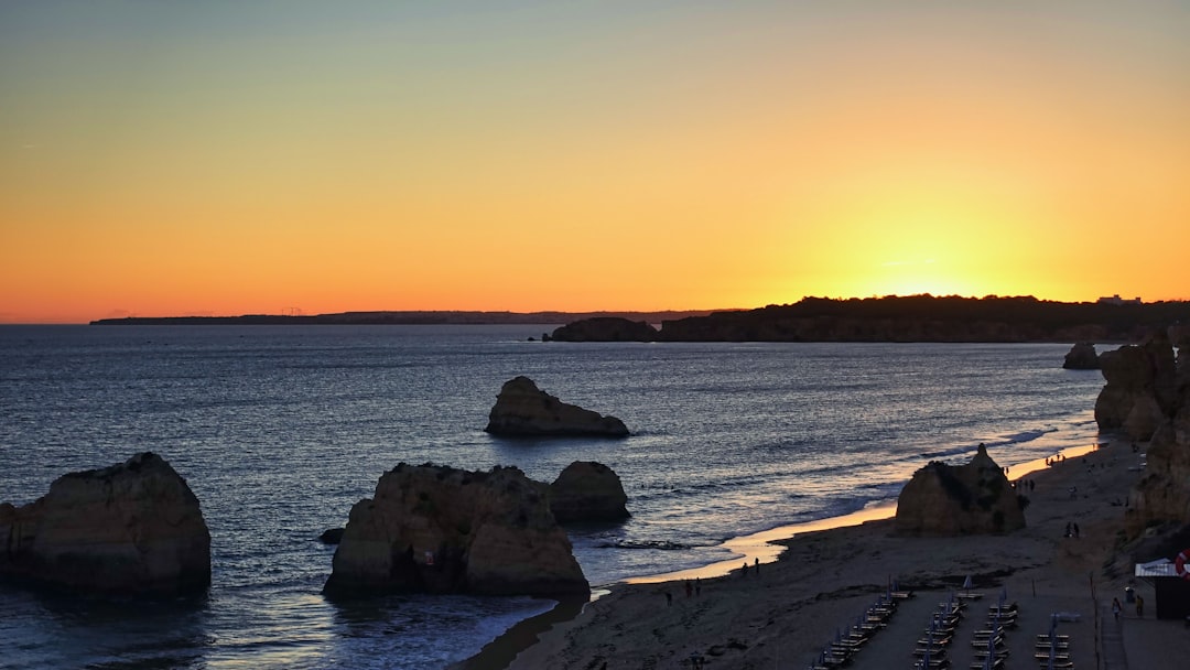 a beach with rocks and water