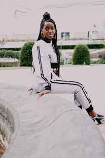 a man sitting on a ledge