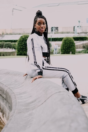 a man sitting on a ledge