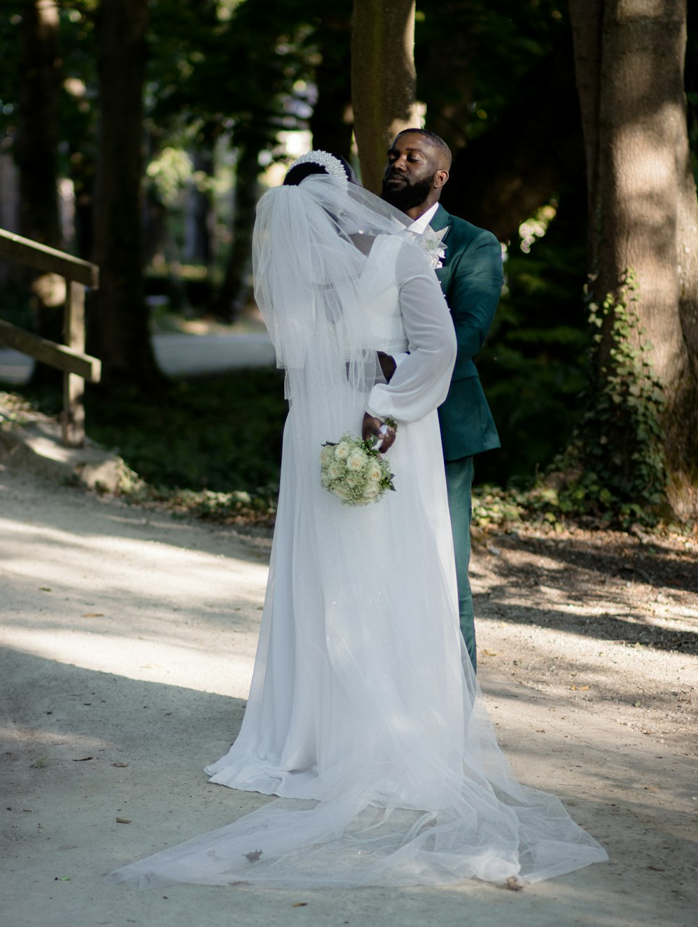 a man and woman in wedding attire