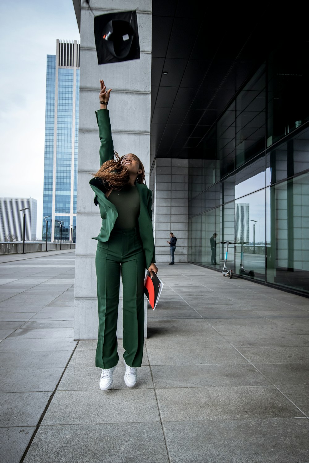 a woman in a green suit