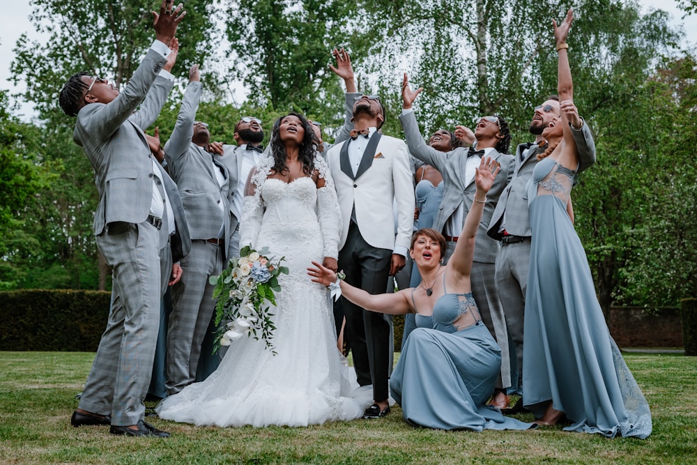 a group of people in formal wear