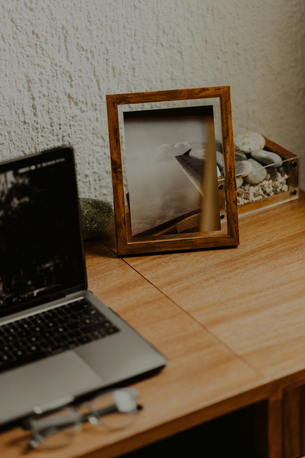 a laptop sits on a table