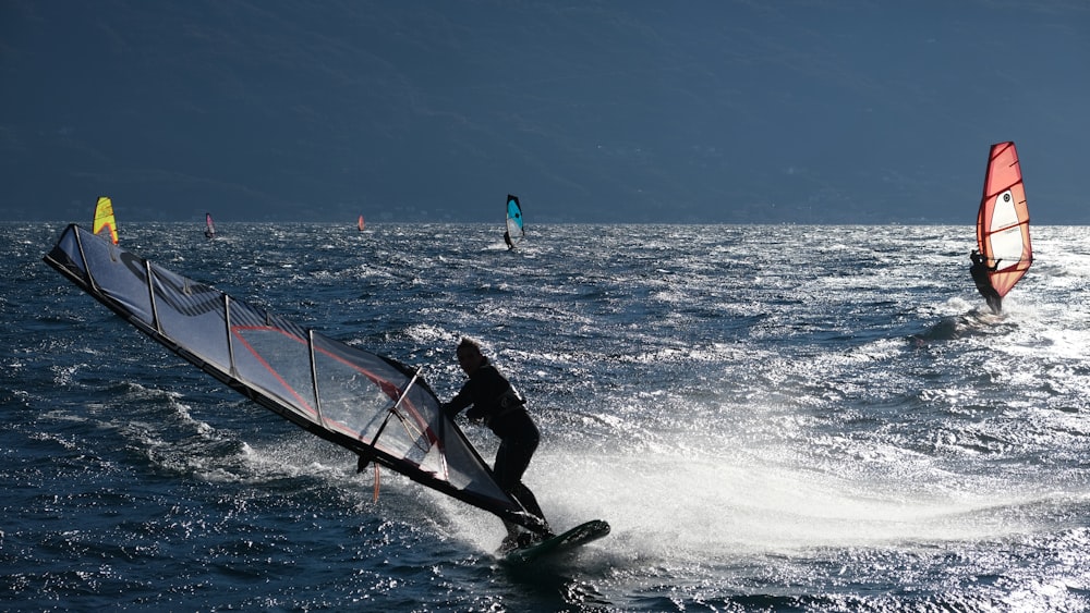 a man wind surfing in the sea