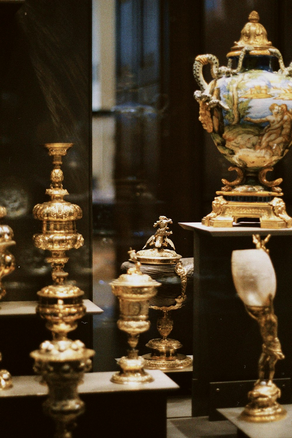 a group of antique vases