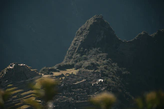 a city below a mountain
