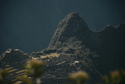 a city below a mountain