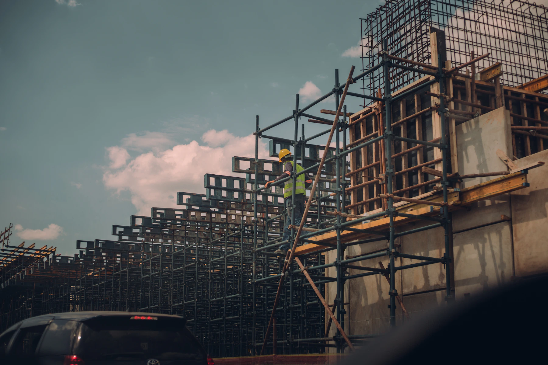 Scaffolding around a building under construction