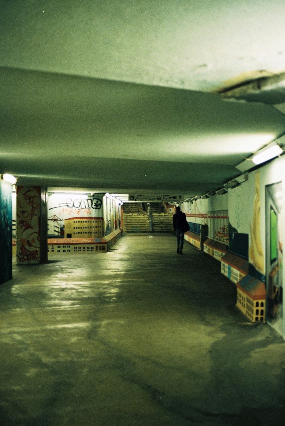 a person walking down a hall