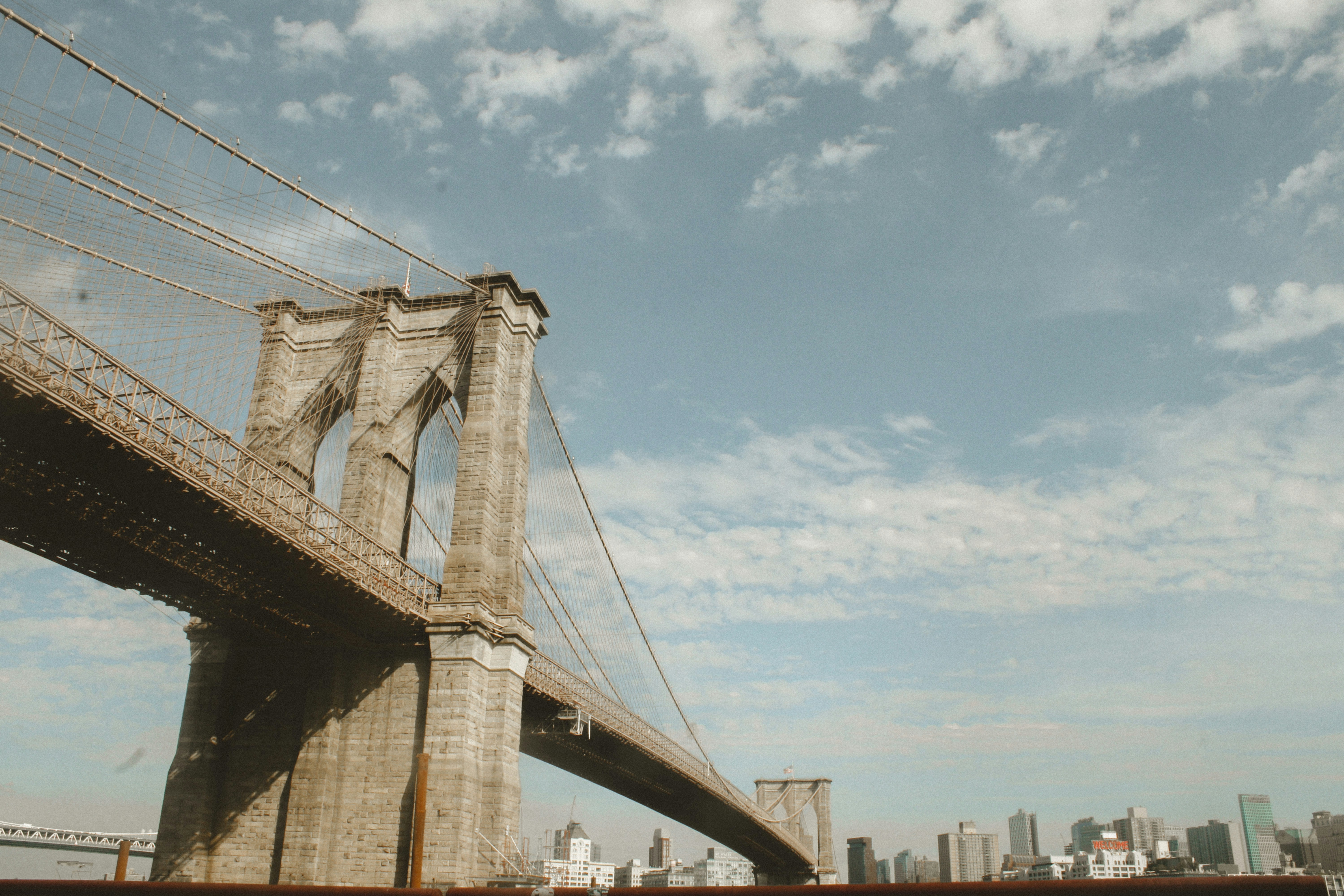 a bridge with a city in the background