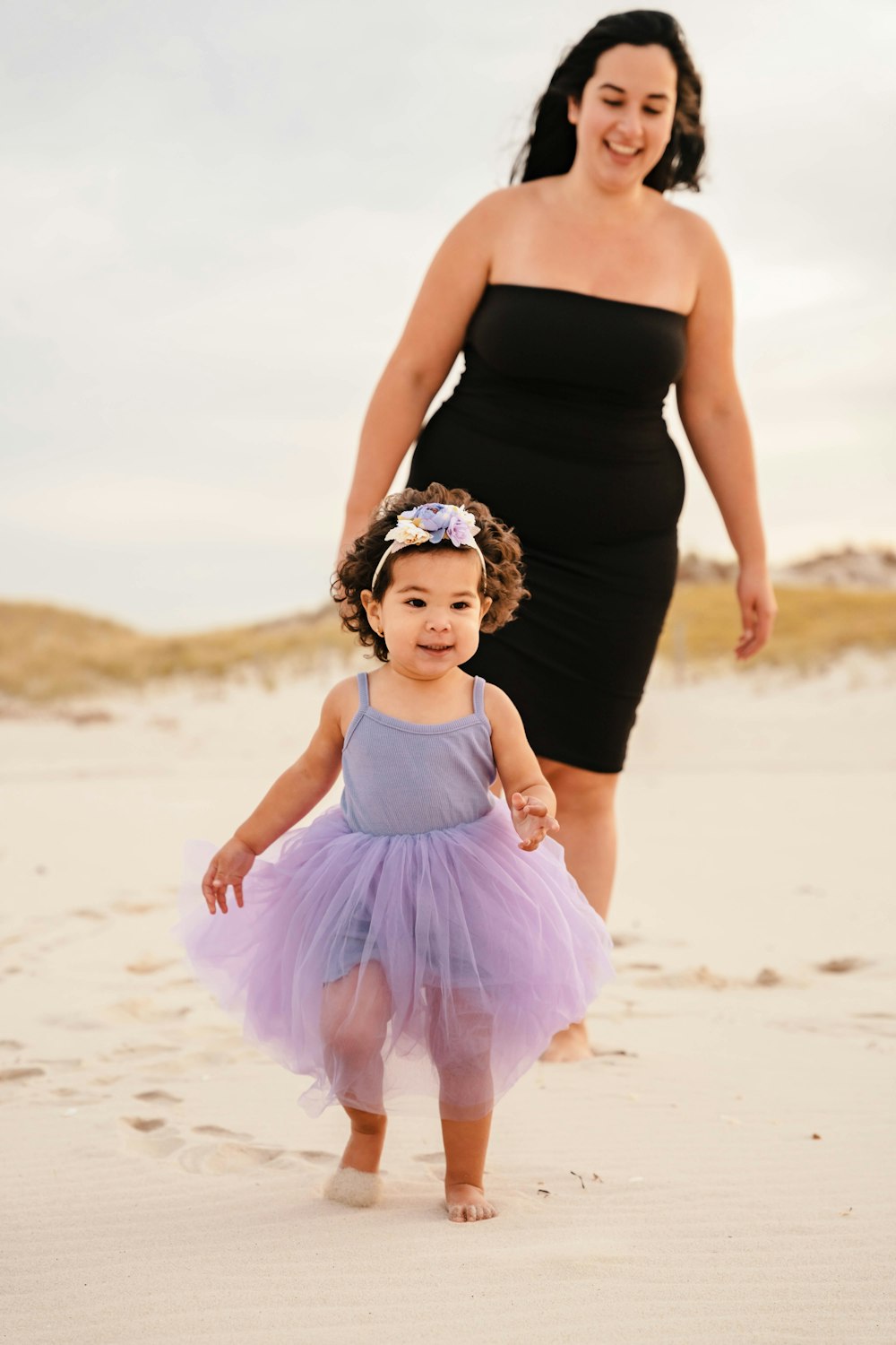 a person and a child on a beach