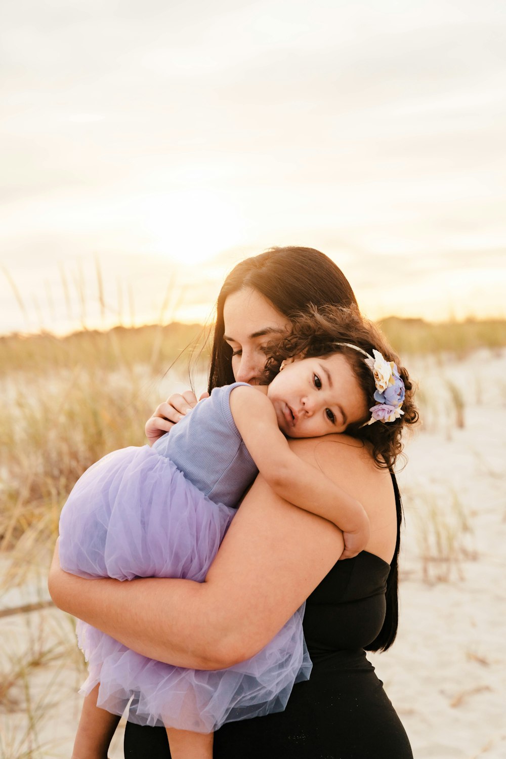 a person holding a baby