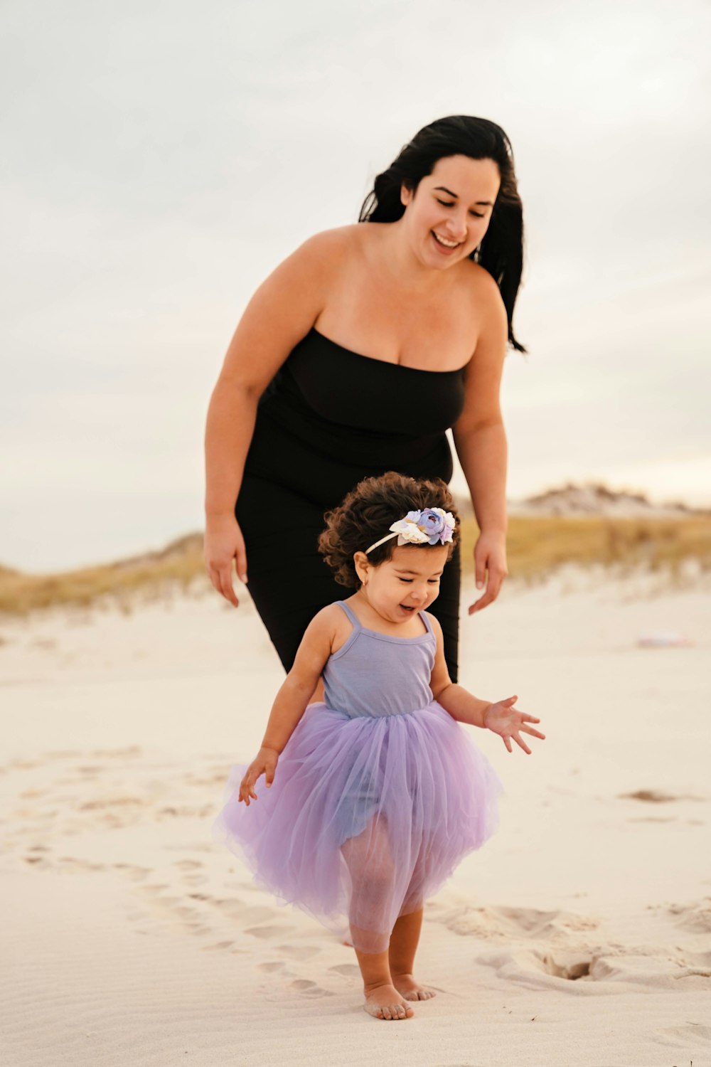 a person and a child on a beach