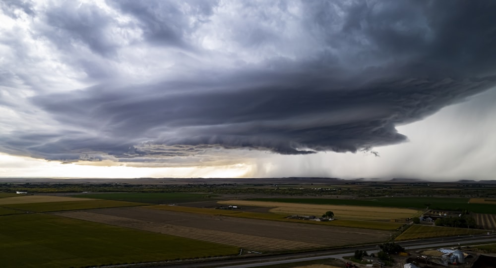 a large field with a tornado