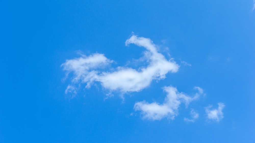 a blue sky with white clouds