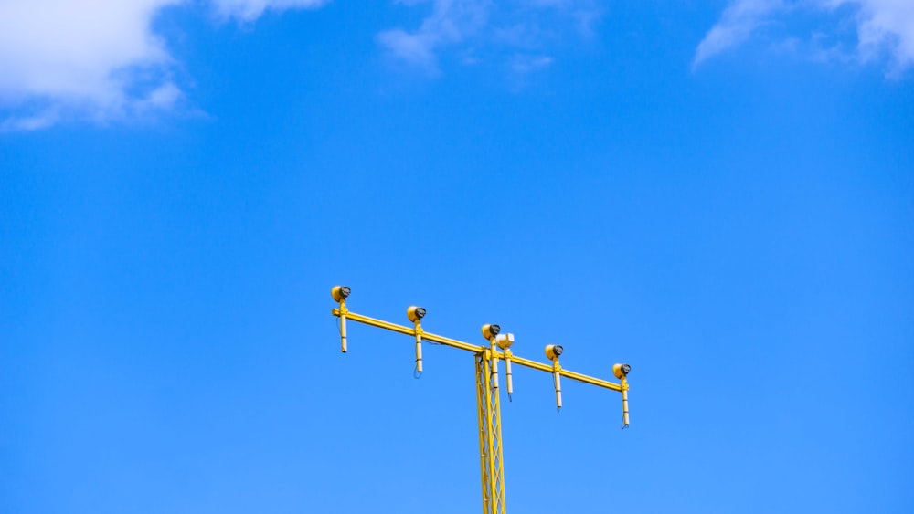 a cross with a blue sky