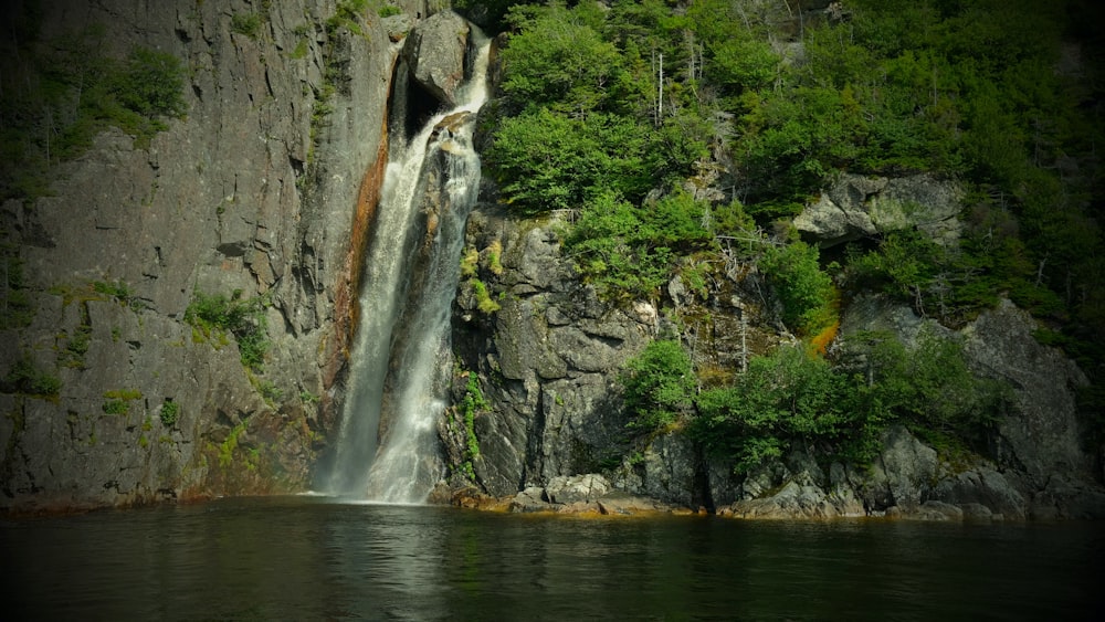 a waterfall over a cliff