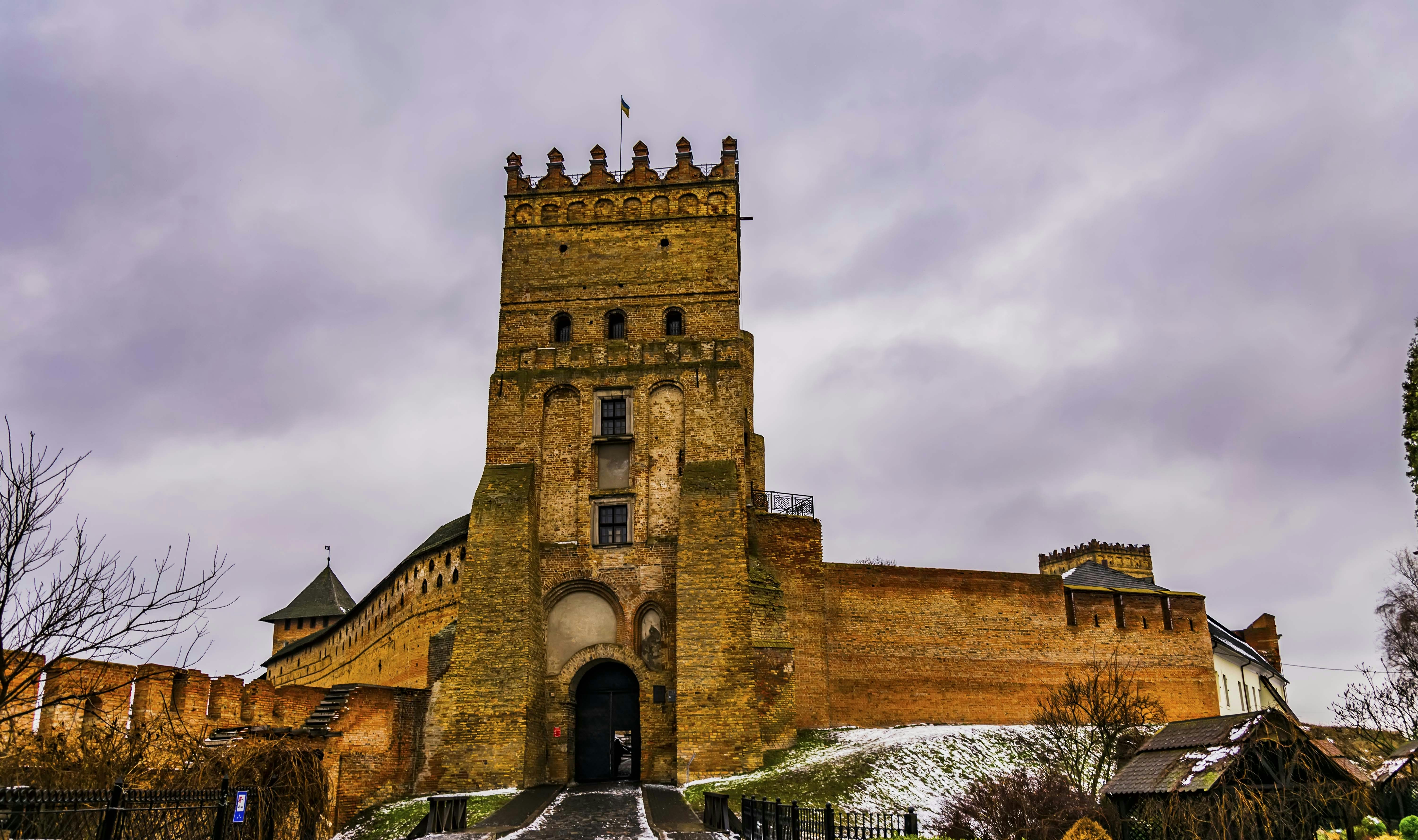a large brick building with a tower