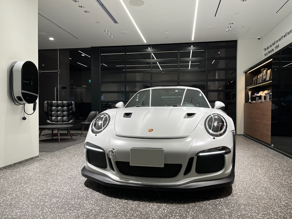 a white car in a showroom