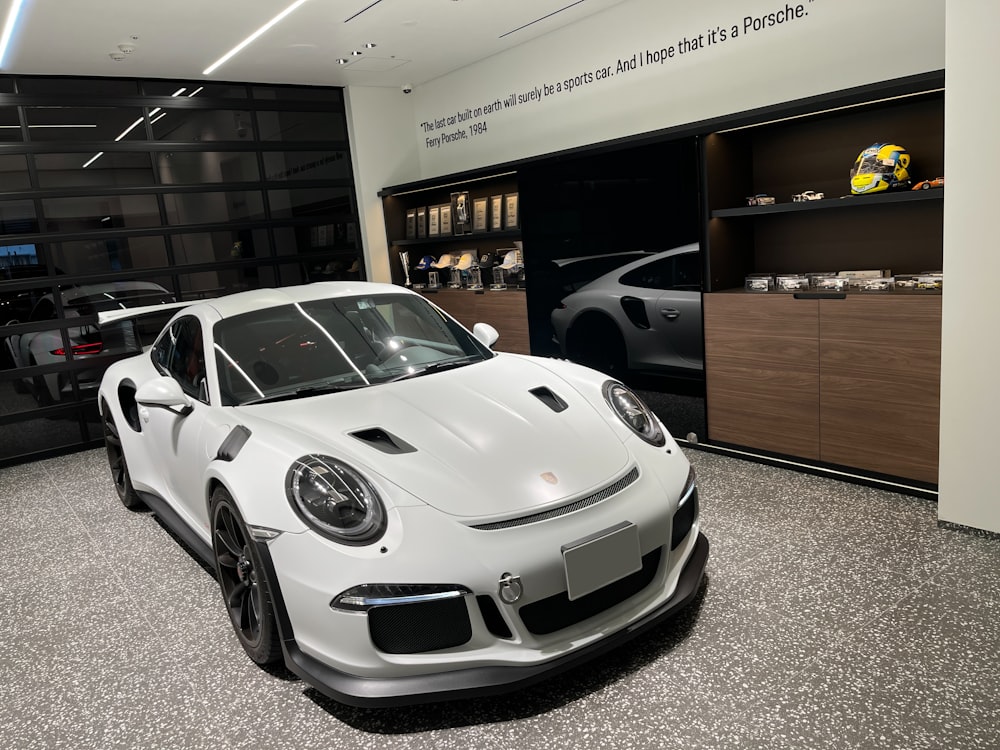 a white car in a showroom