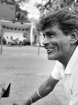 Smiling customers sharing their positive loan experience outdoors.