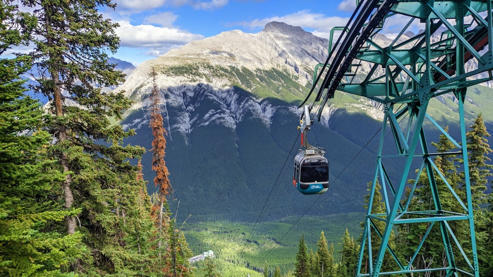 a cable car going up a mountain