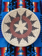 a colorful circle with a symbol in it