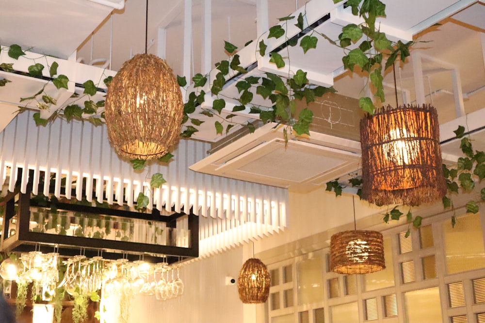 a room with chandeliers and plants