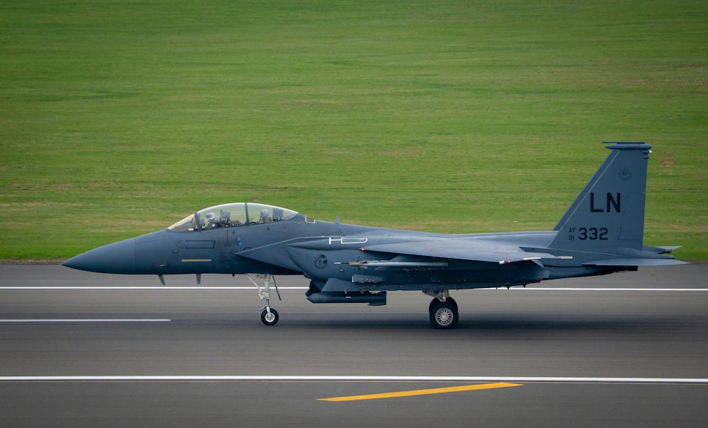 a fighter jet on a runway