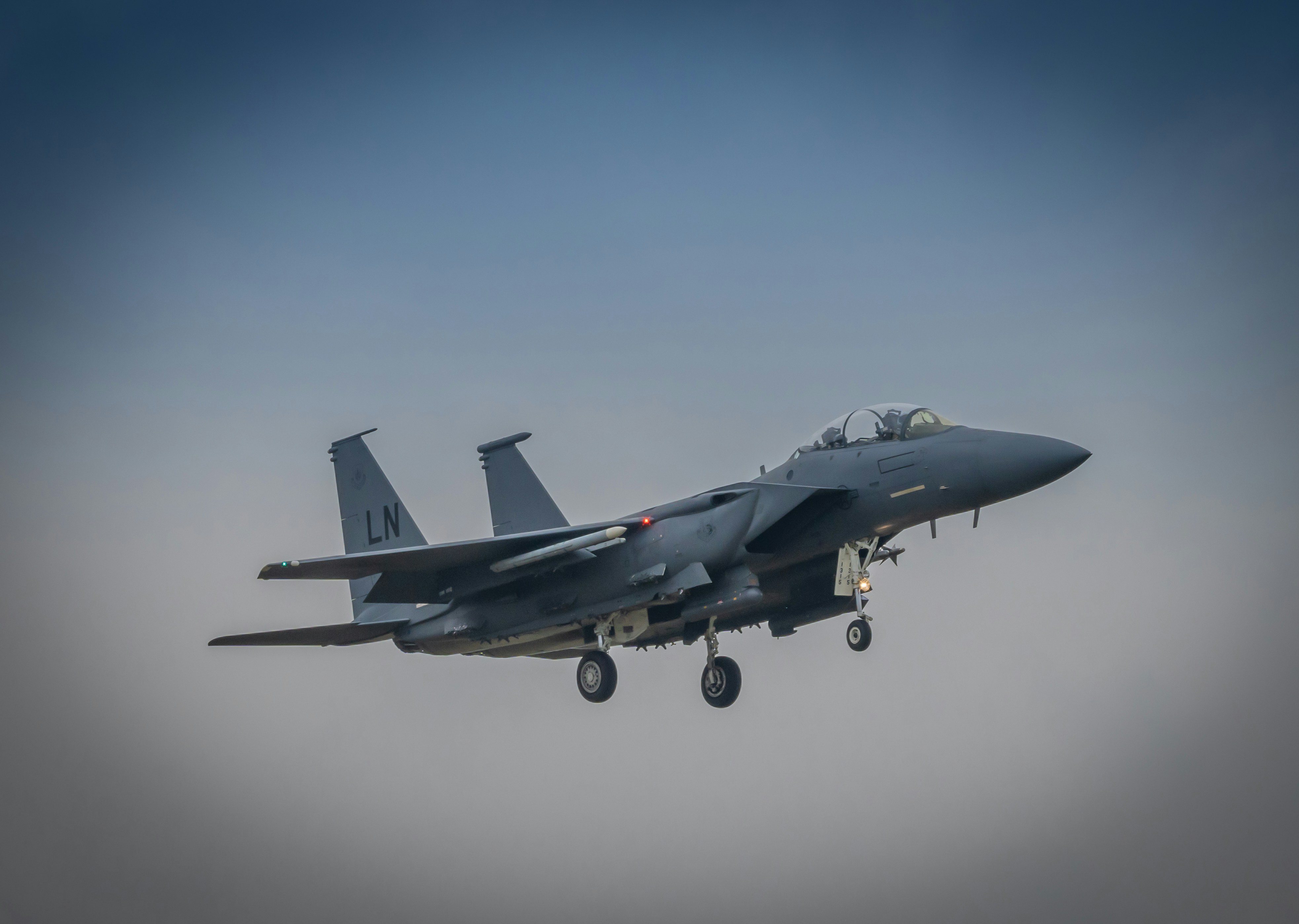 Chinese J-15 fighter jet flying over ocean near Japanese coast during military exercises