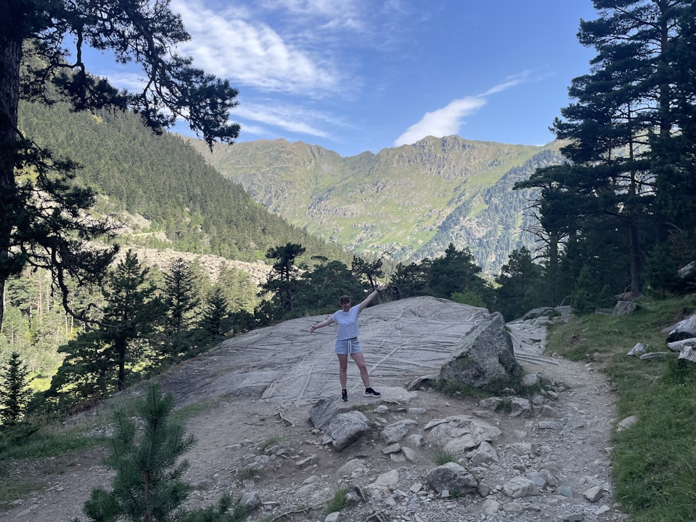 a man standing on a rock