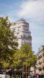 a building with trees in front of it
