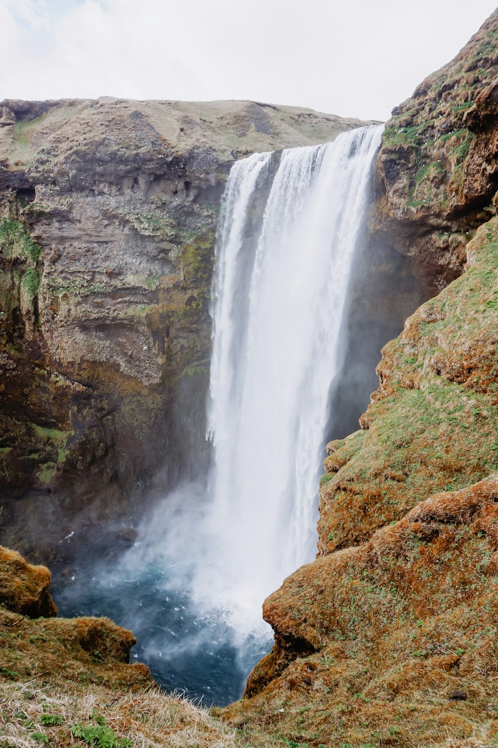 a waterfall in a rocky area