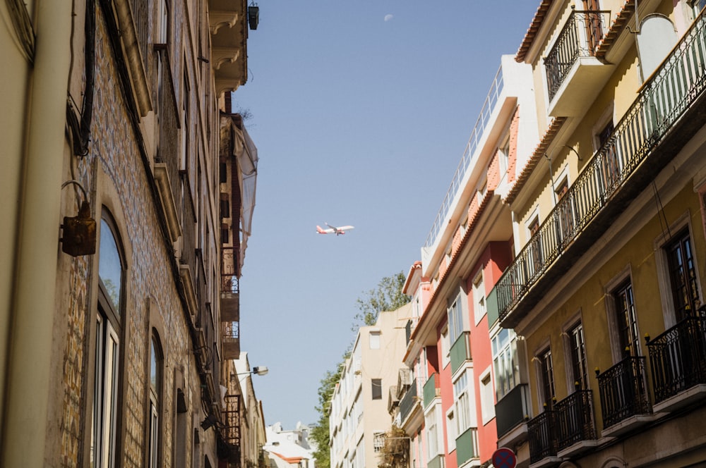 a plane flying over a city