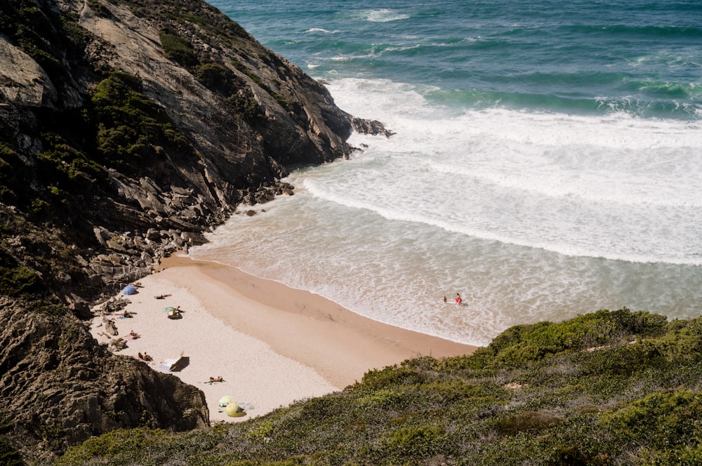 a beach with people on it