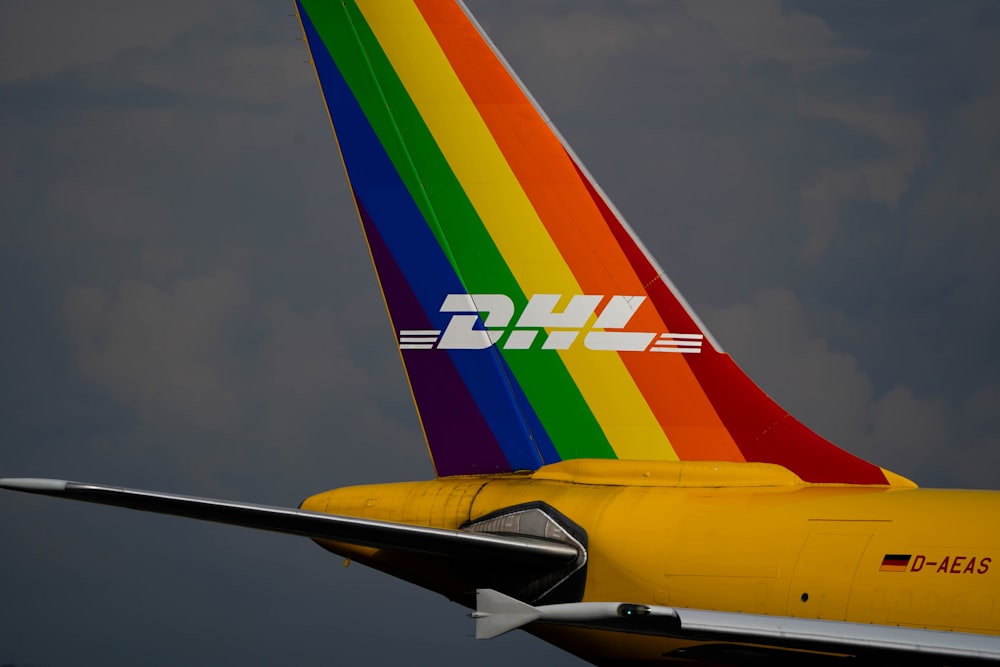 a plane with a rainbow painted on it
