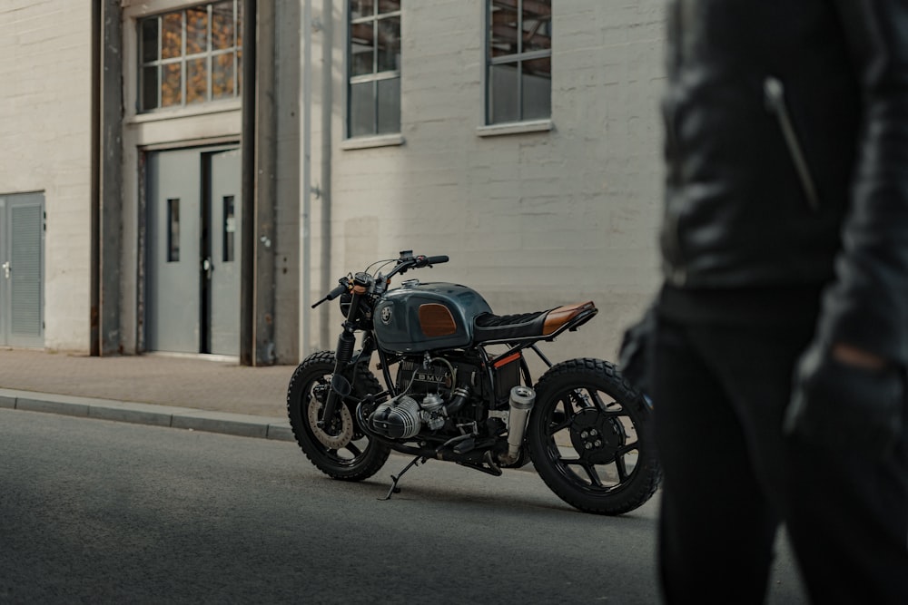 a motorcycle parked on the side of a street