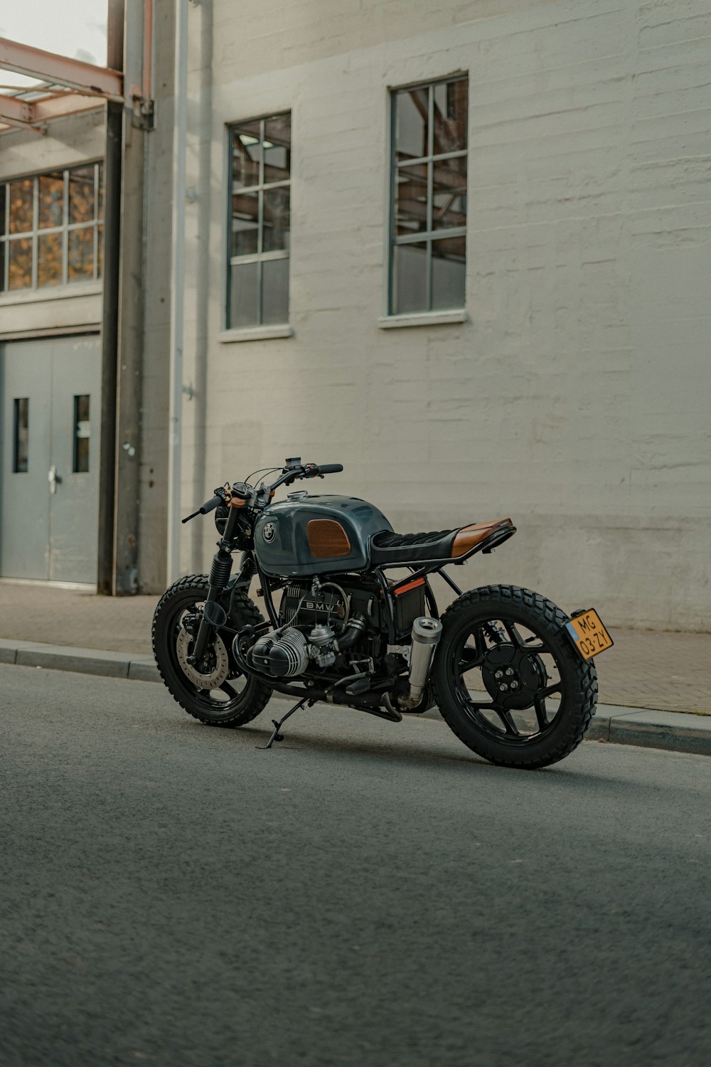 a motorcycle parked on the side of a street